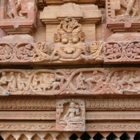 Temple carving at Mukteshvara Temple depicting scenes from the Panchatantra tale of the monkey and the crocodile.