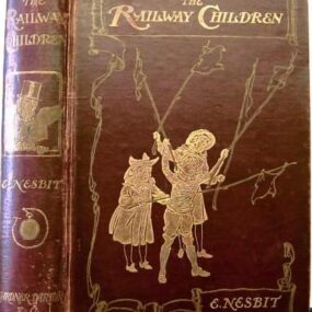 First-edition 1906 cover of E. Nesbit's The Railway Children.